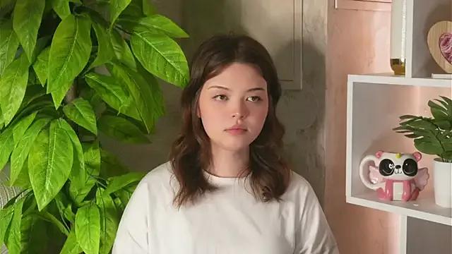 EllyRoades — play with hair + eye contact